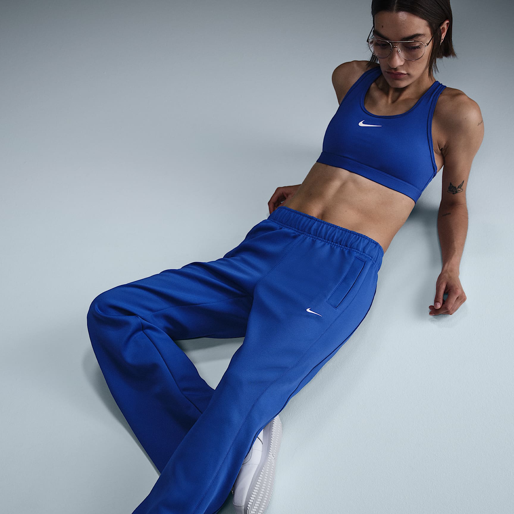 Nike Sportswear Windrunner Women's Mid-Rise Slim Knit Pants