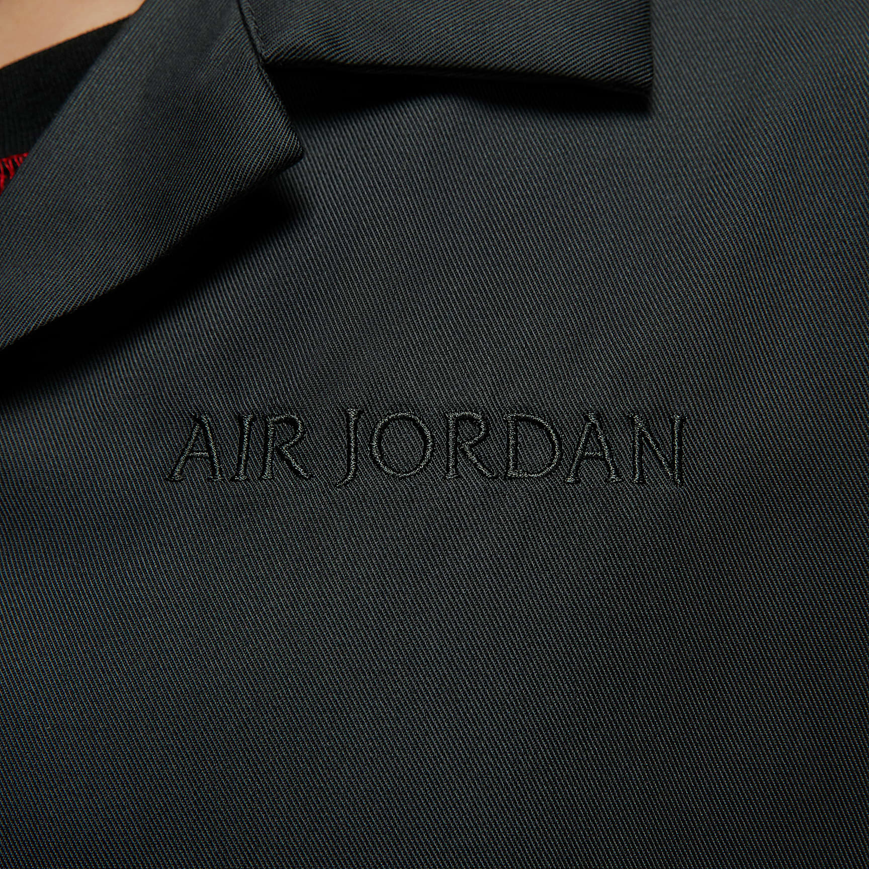 Air Jordan Women's Long-Sleeve Woven Top