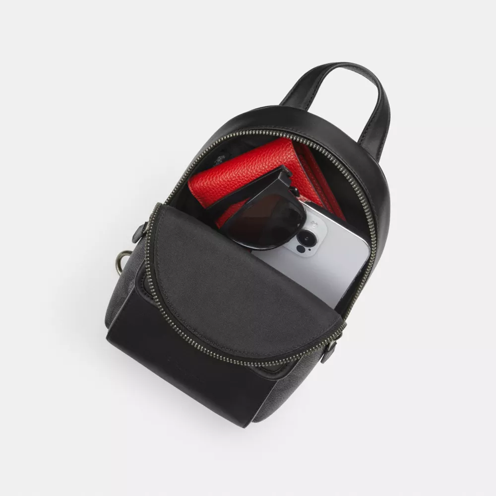 Сумка COACH Small Turnlock Sling Pack In Signature Canvas