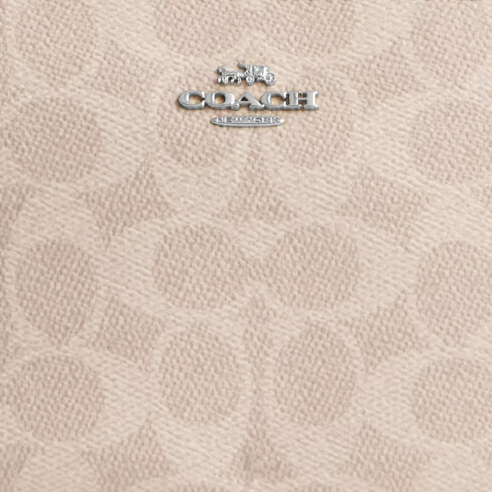 Сумка COACH Nolita 19 In Signature Canvas