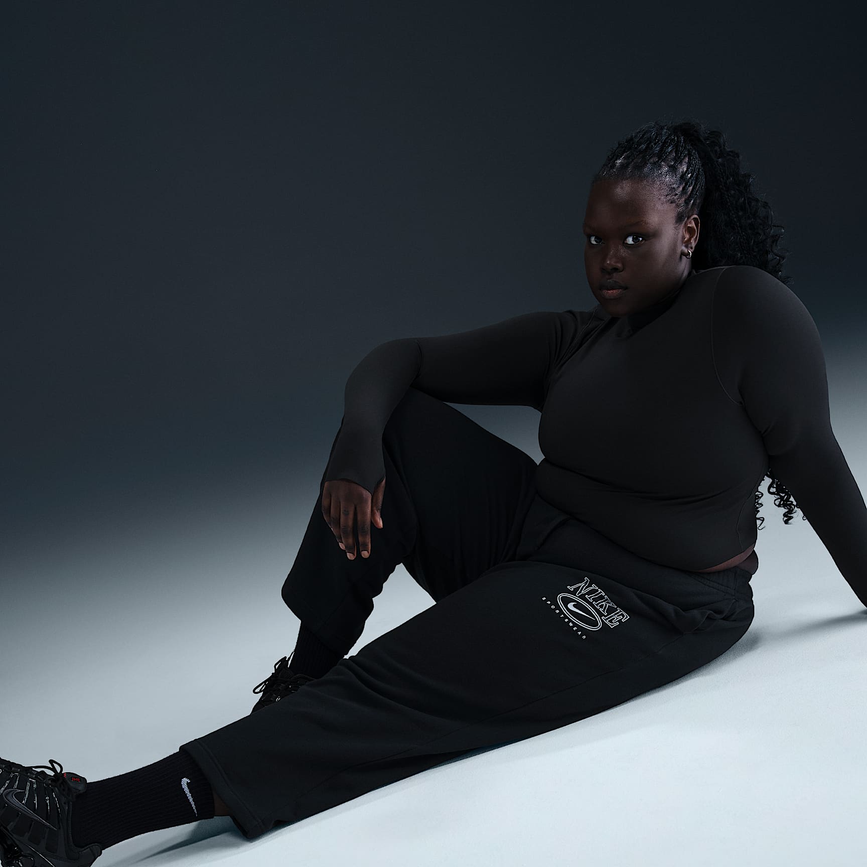 Nike Sportswear Club Fleece Women's Mid-Rise Wide-Leg Graphic Pants (Plus Size)