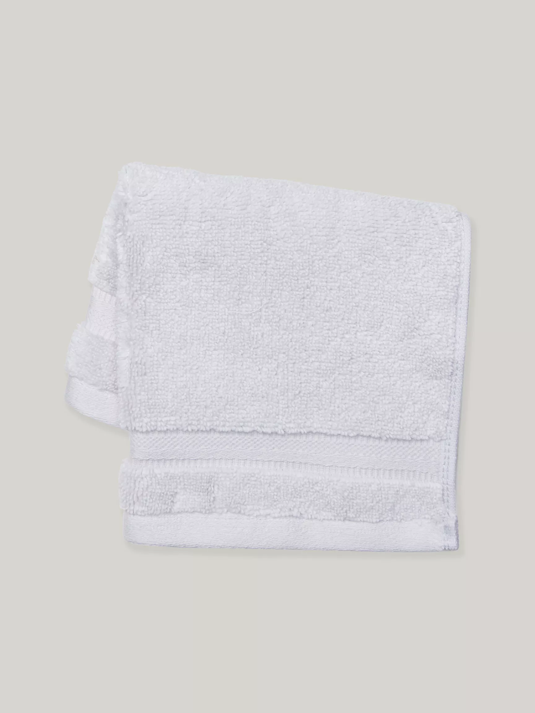 Мочалка Томми Хилфигер, Однотонная салфетка для умывания светло-серого цвета