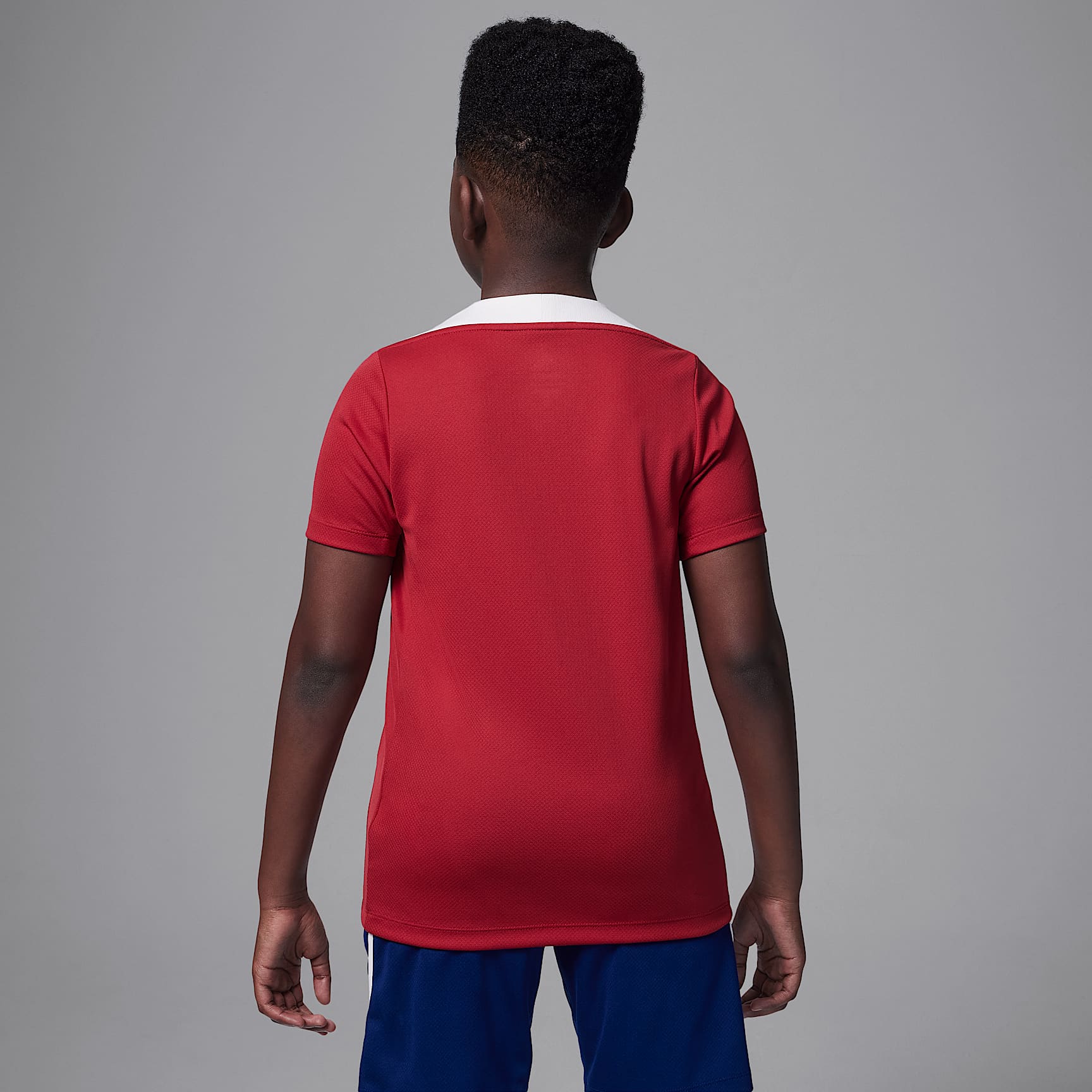 Paris Saint-Germain Strike Fourth Big Kids' Jordan Dri-FIT Soccer Knit Short-Sleeve Top