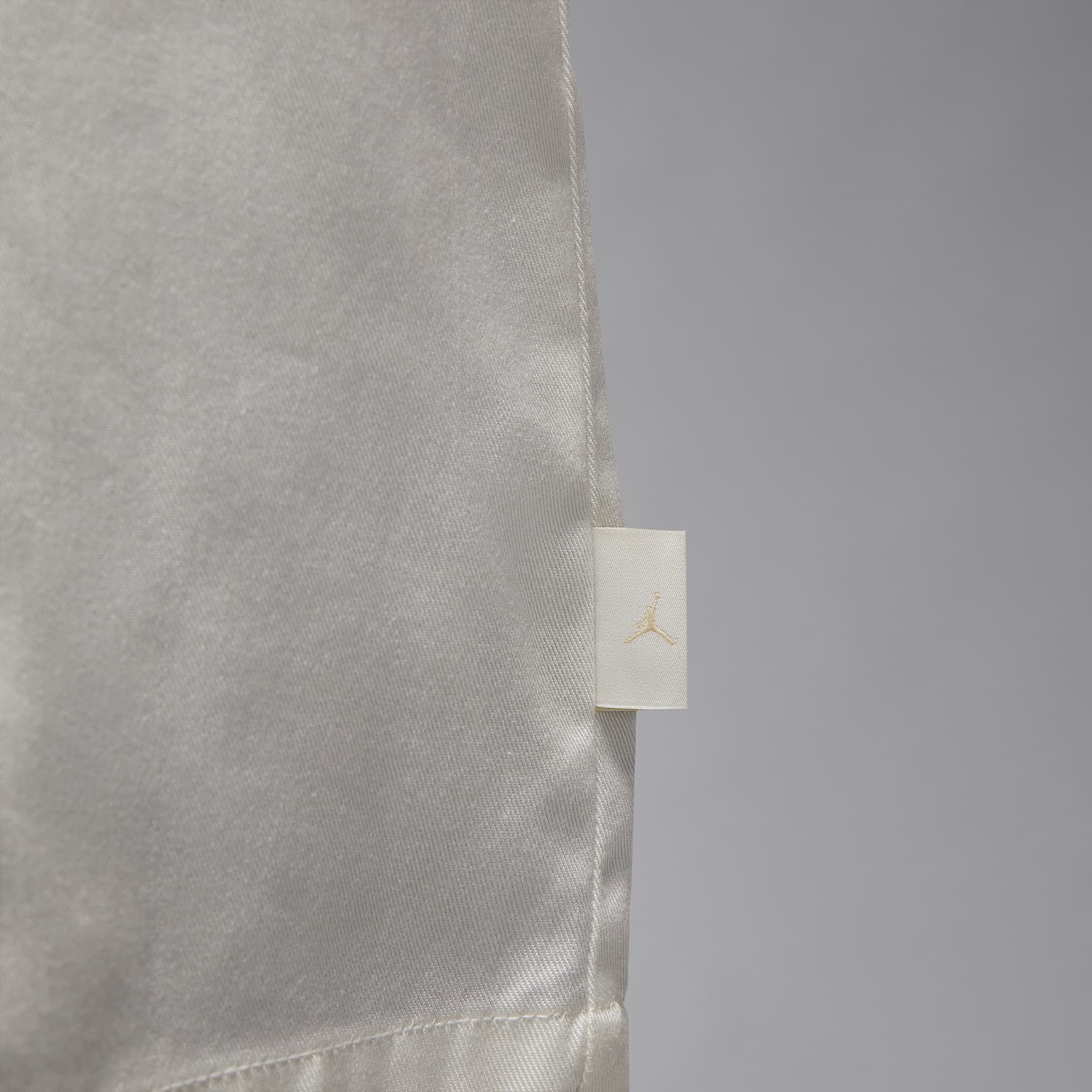 Air Jordan Women's Long-Sleeve Woven Top