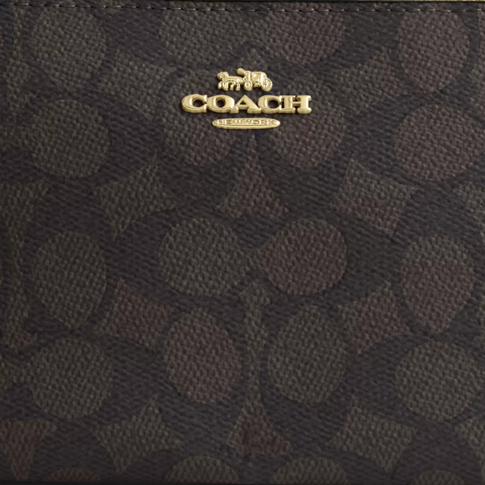 Сумка COACH Nolita 19 In Signature Canvas