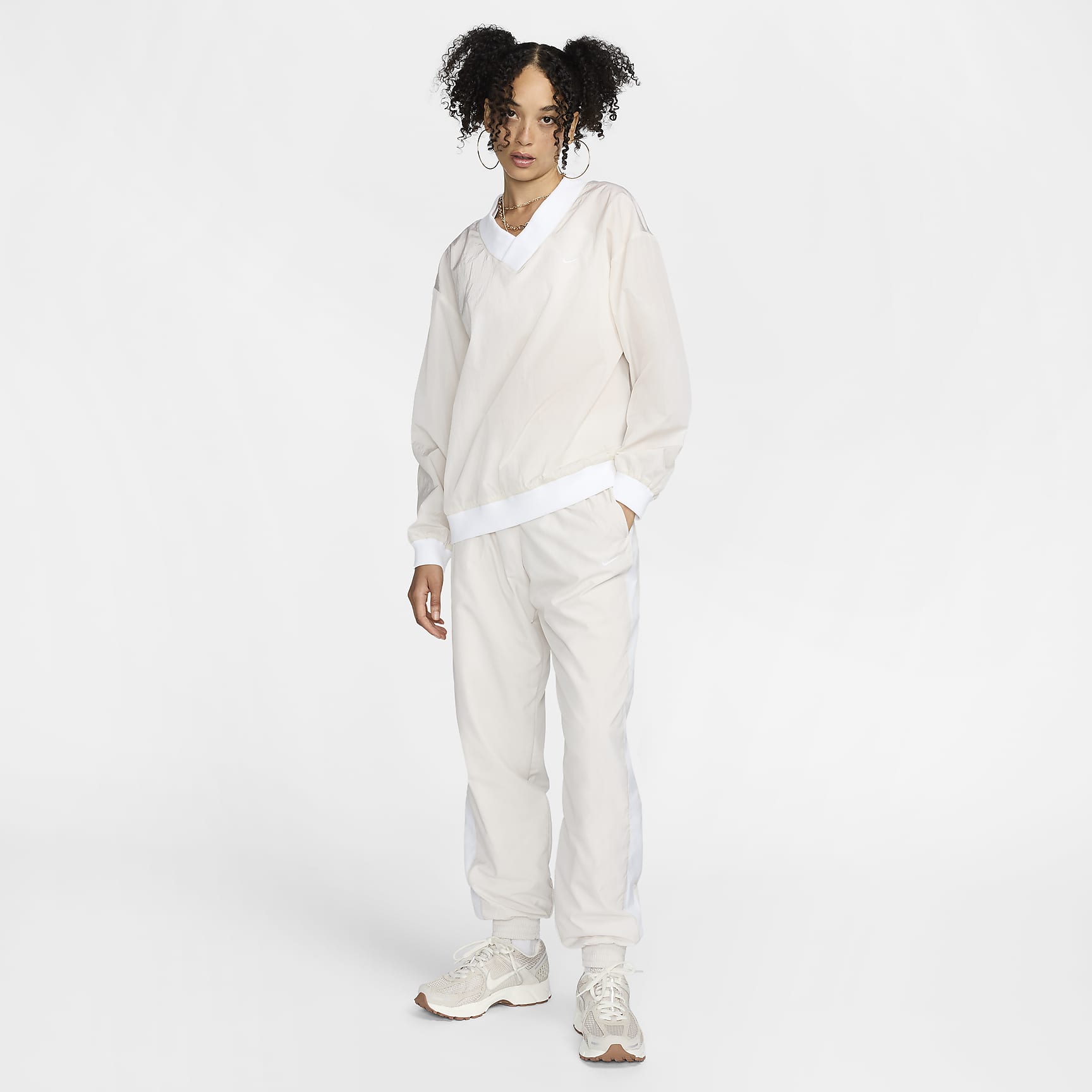 Nike Sportswear Essential Women's Loose UV Woven Long-Sleeve V-Neck Top