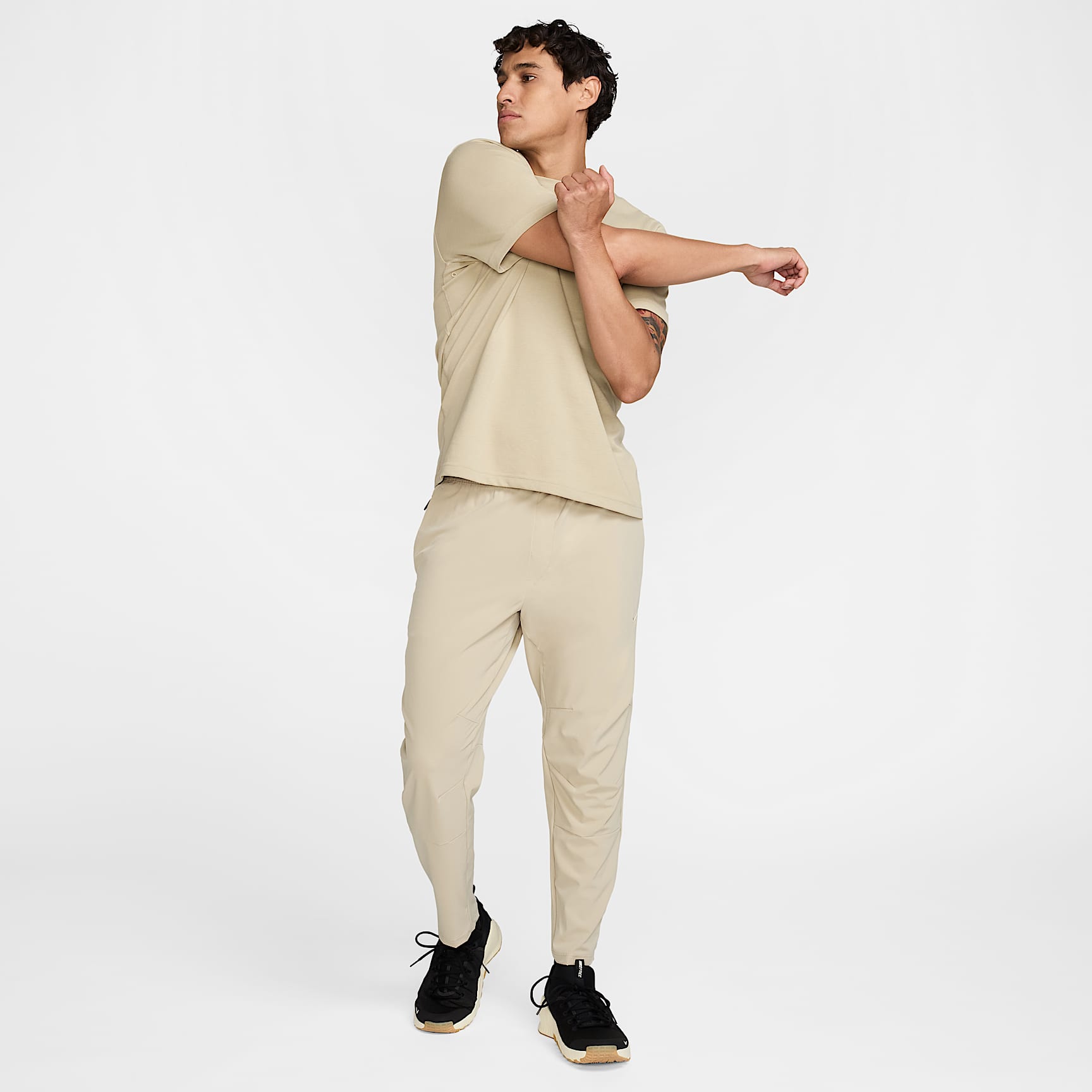 Nike Unlimited Men's Dri-FIT Tapered Leg Versatile Pants