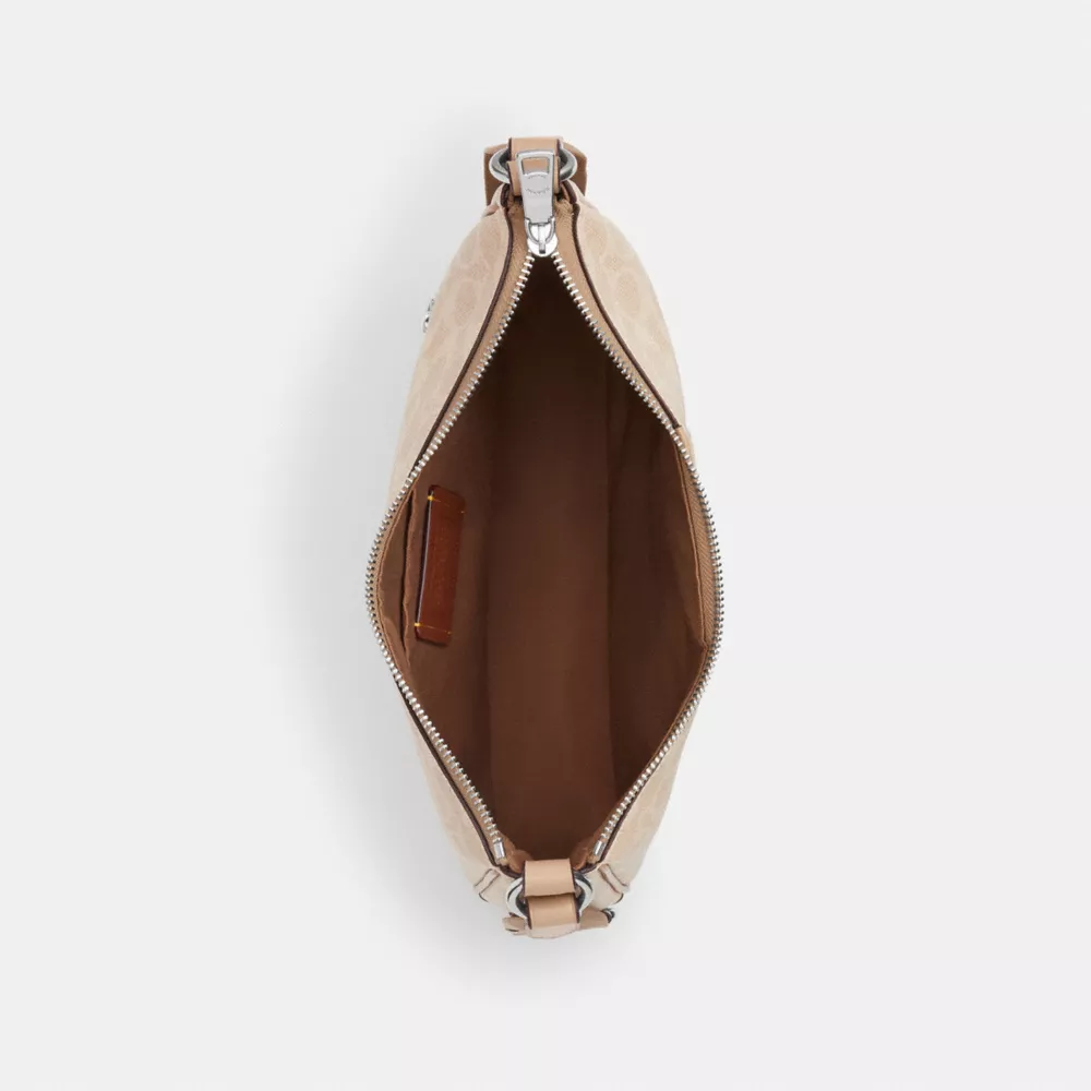 Сумка COACH Ellie File Bag In Signature Canvas With Stripe