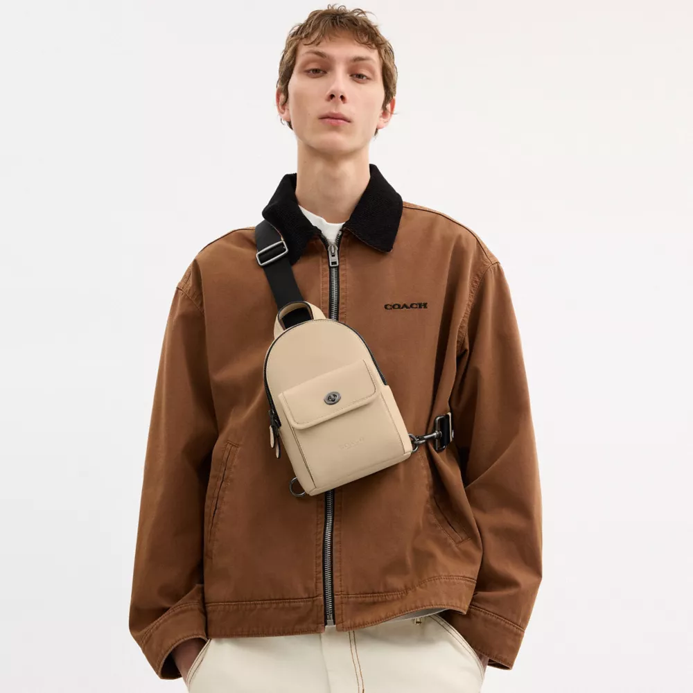 Сумка COACH Small Turnlock Sling Pack