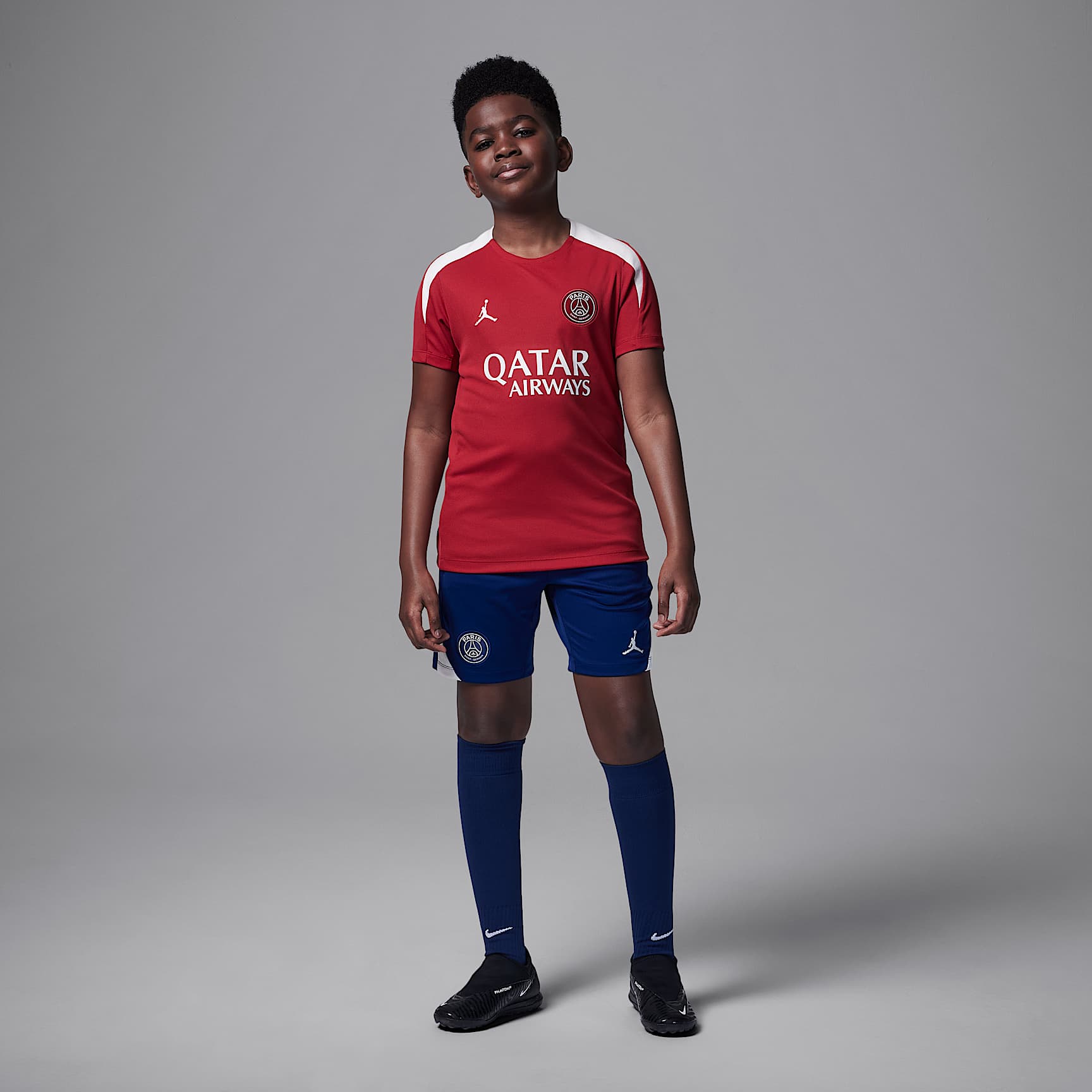 Paris Saint-Germain Strike Fourth Big Kids' Jordan Dri-FIT Soccer Knit Short-Sleeve Top