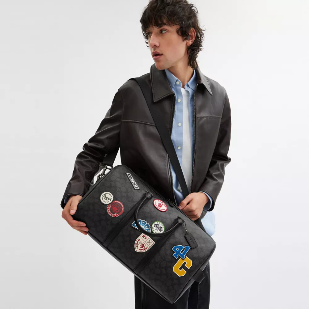 Сумка COACH Venturer Bag In Signature Canvas With Patches