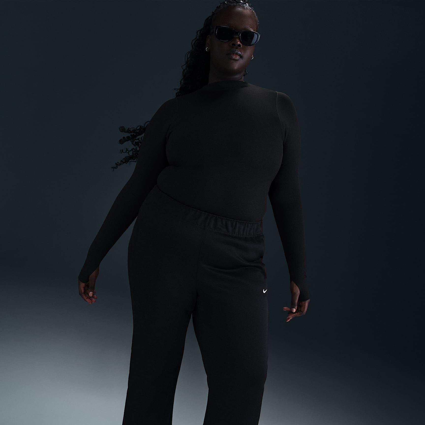 Nike Sportswear Windrunner Women's Mid-Rise Slim Knit Pants (Plus Size)