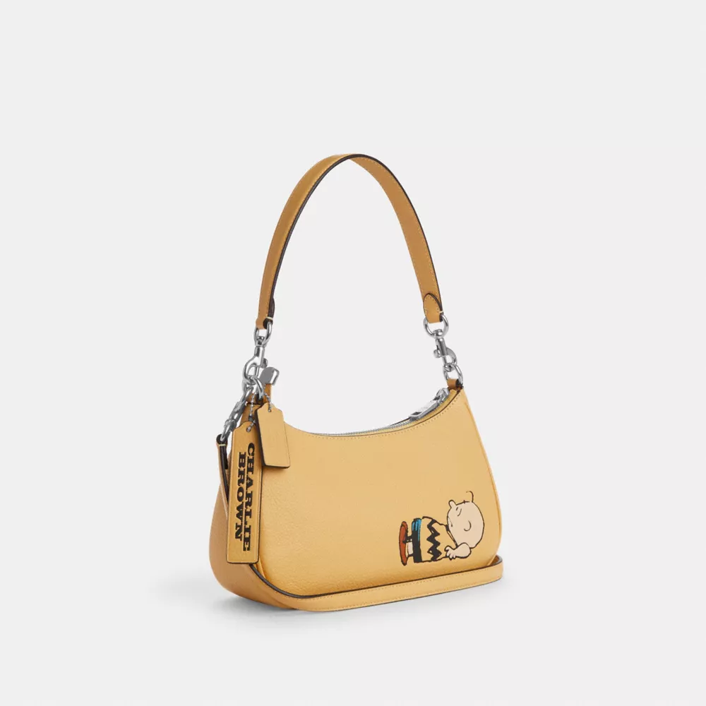 Сумка COACH Coach X Peanuts Teri Shoulder Bag With Charlie Brown