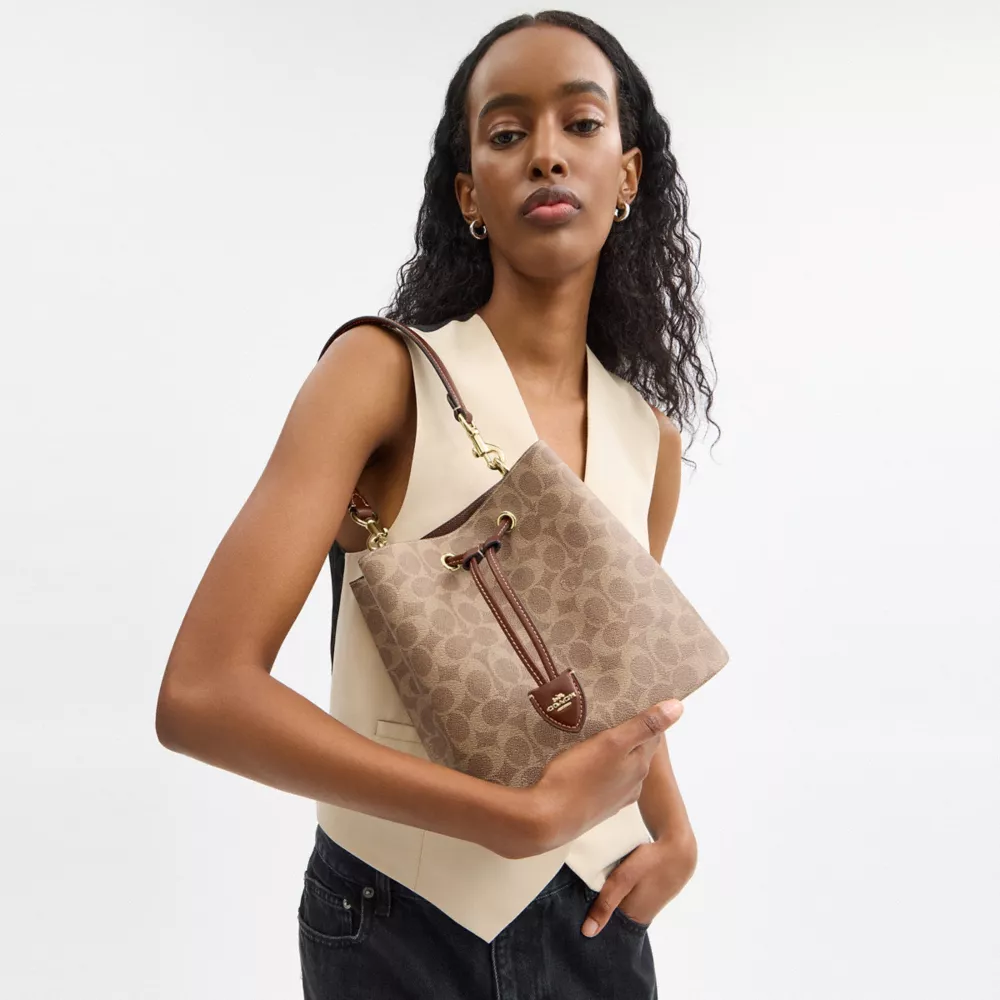 Сумка COACH Rowan Bucket Bag In Signature Canvas