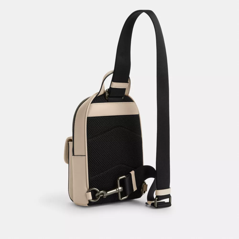 Сумка COACH Small Turnlock Sling Pack