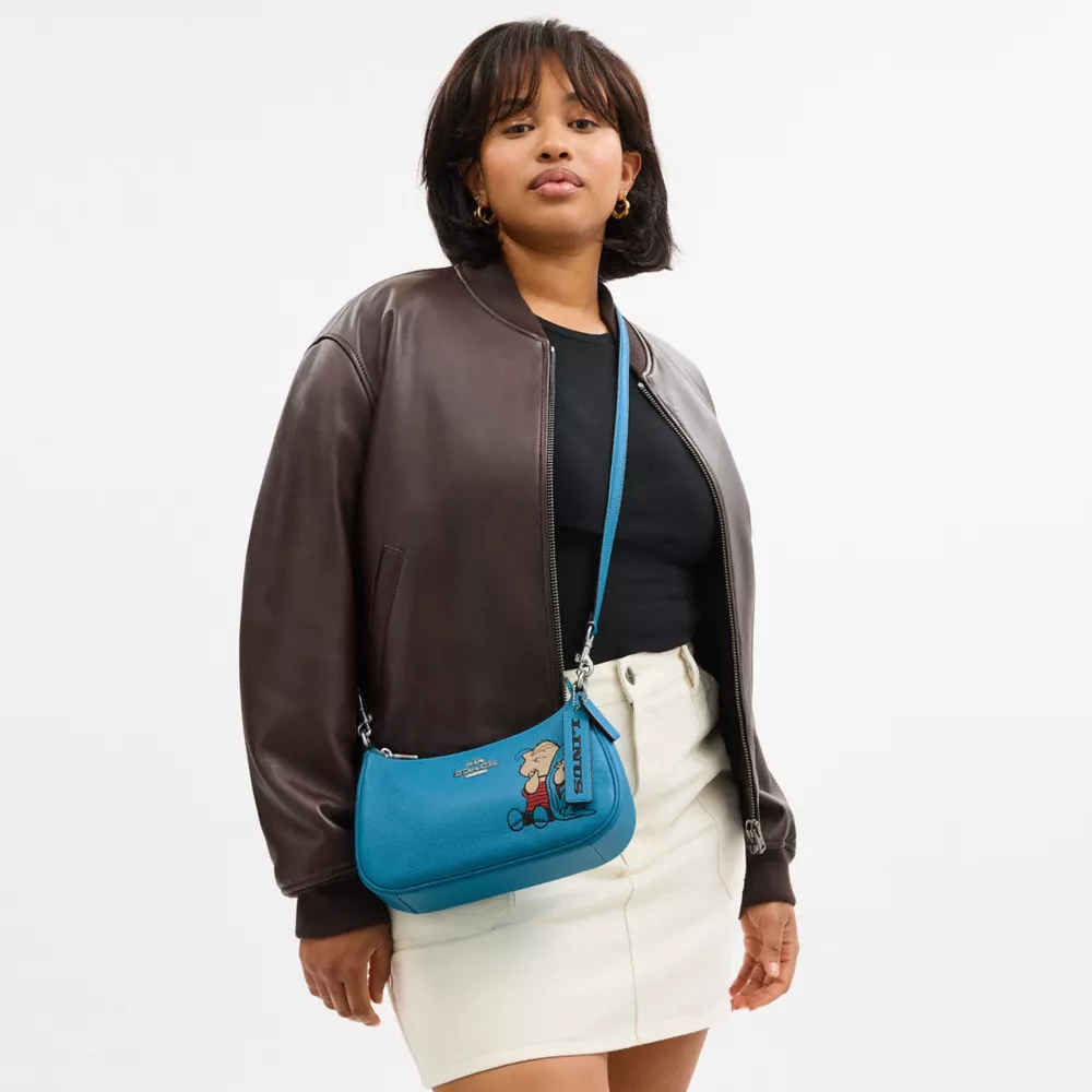 Сумка COACH Coach X Peanuts Teri Shoulder Bag With Linus