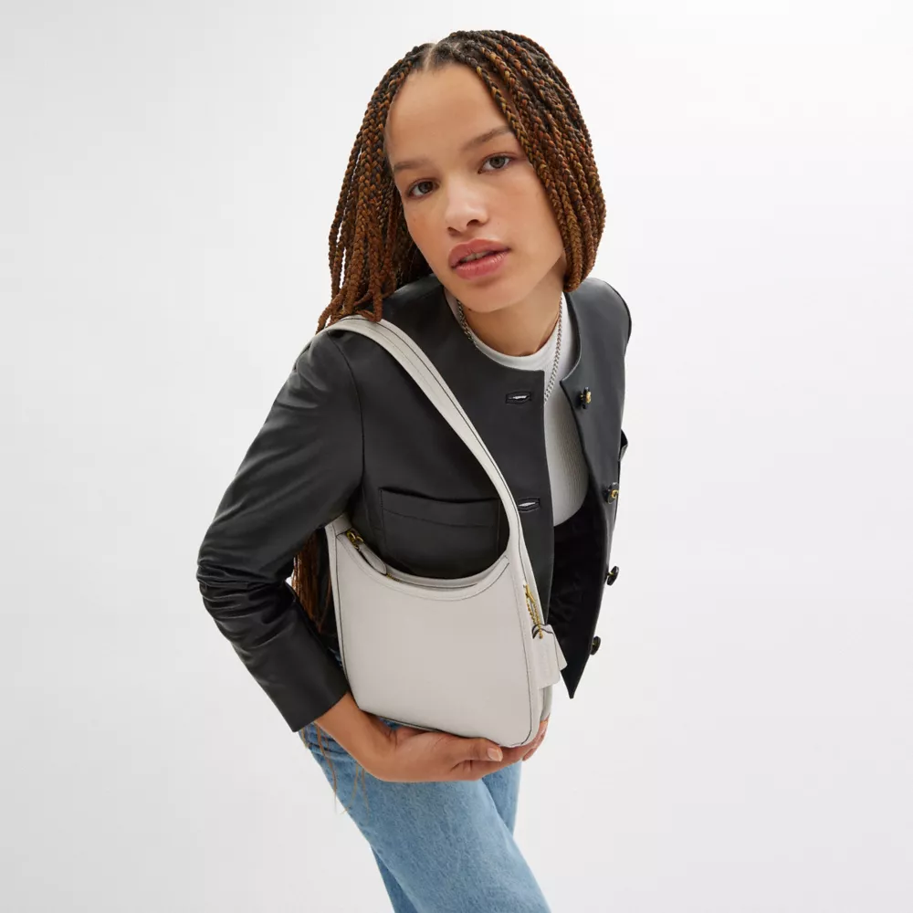 Сумка COACH Curve Zip Bag