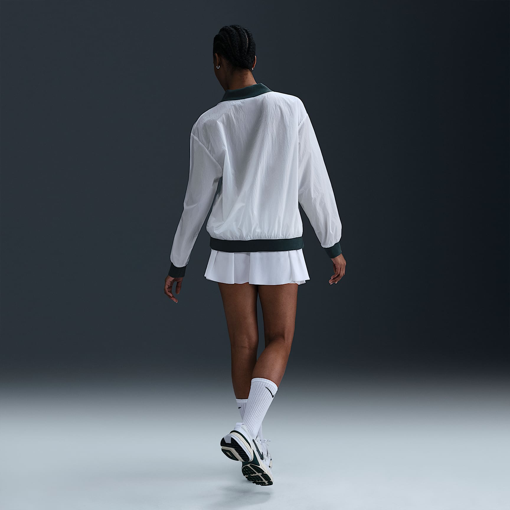 Nike Sportswear Essential Women's Loose UV Woven Long-Sleeve V-Neck Top